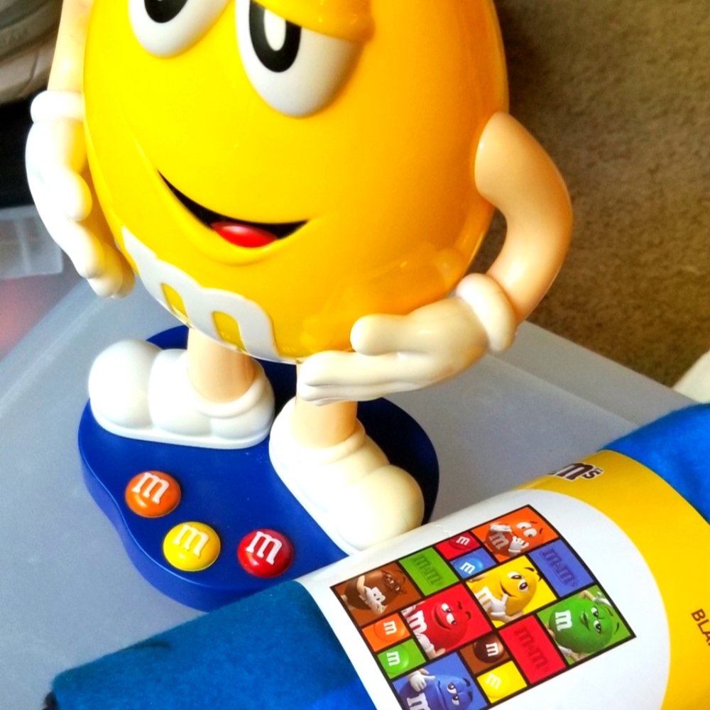 Collectible Yellow M&M Dispenser and Fleece Blanket